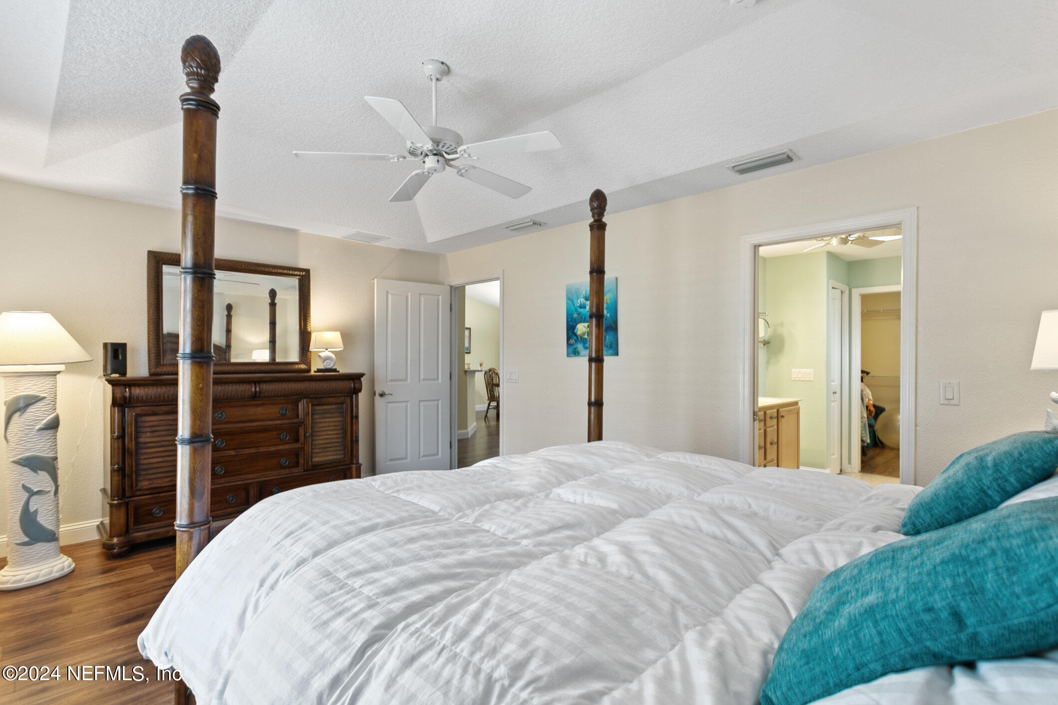 121 Cypress Road St. Augustine, FL 32086 - Photo 11 of 60 a bedroom with a bed and a flat screen tv
