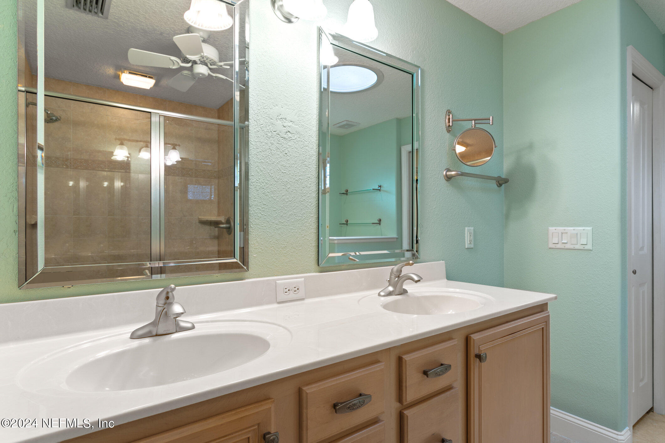 121 Cypress Road St. Augustine, FL 32086 - Photo 12 of 60 a bathroom with a sink and a mirror