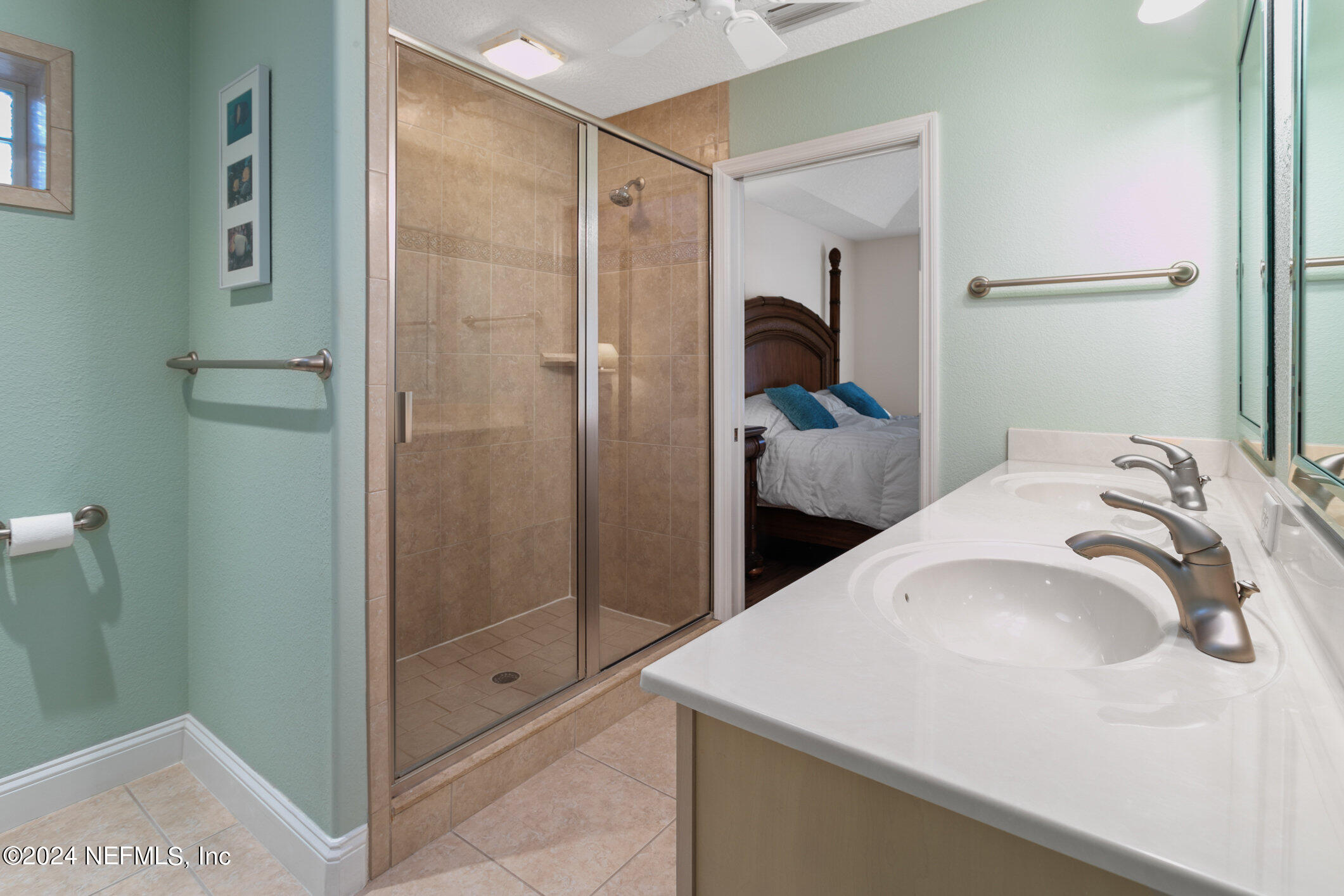 121 Cypress Road St. Augustine, FL 32086 - Photo 13 of 60 a bathroom with a sink and a shower