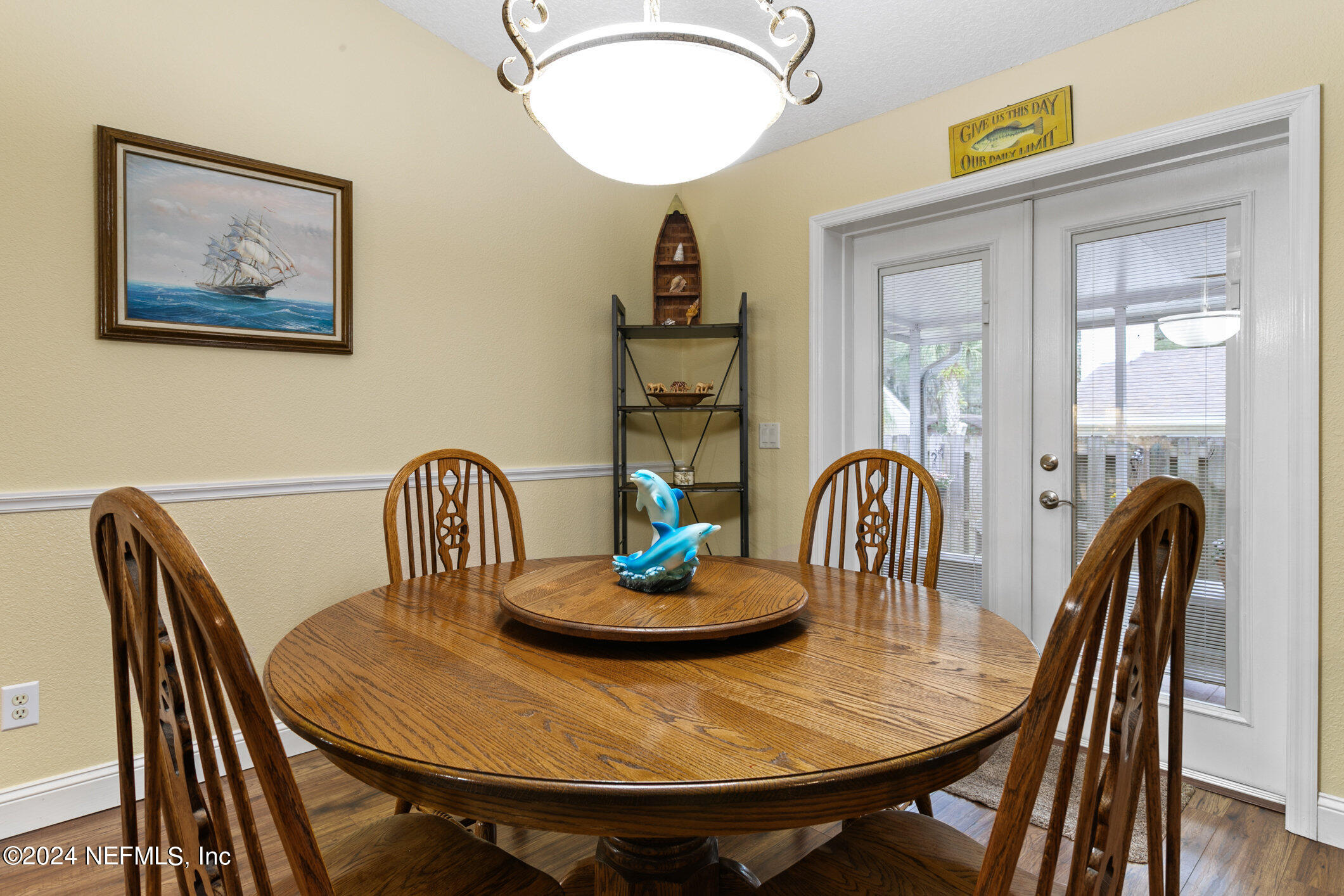121 Cypress Road St. Augustine, FL 32086 - Photo 16 of 60 a view of a dining room with furniture