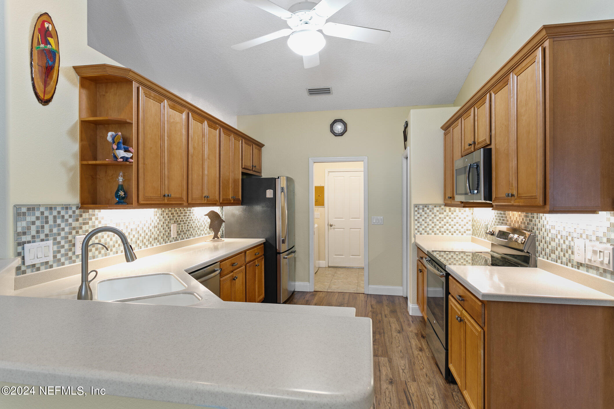 121 Cypress Road St. Augustine, FL 32086 - Photo 18 of 60 a kitchen with a sink cabinets and appliances