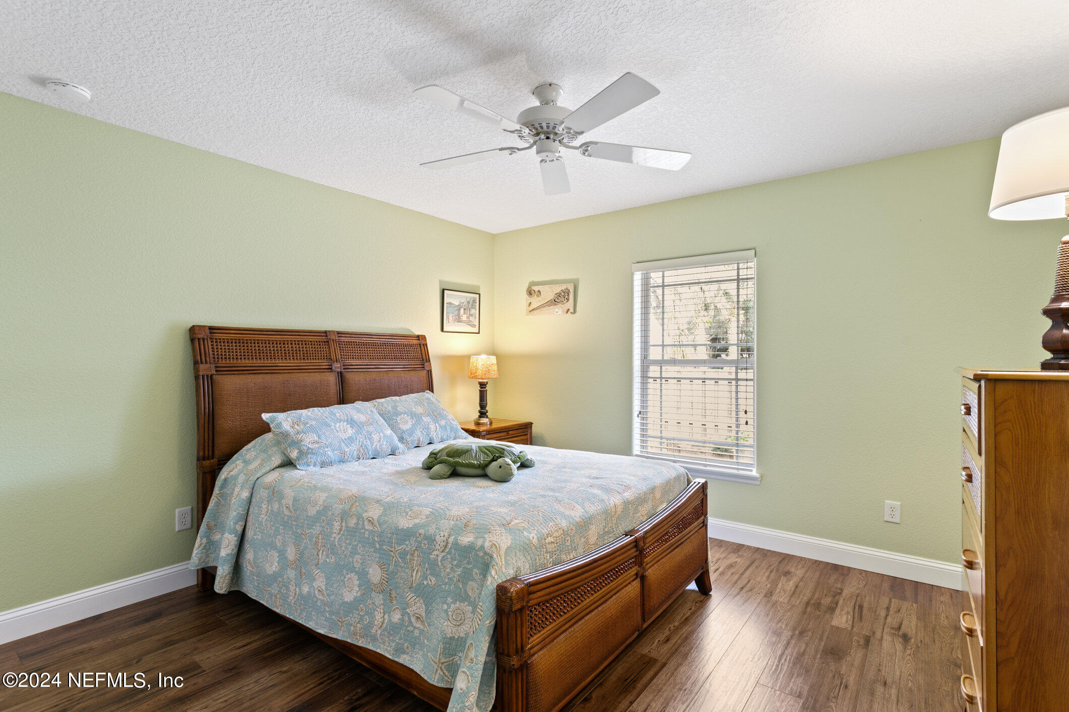121 Cypress Road St. Augustine, FL 32086 - Photo 23 of 60 a bedroom with a bed and window
