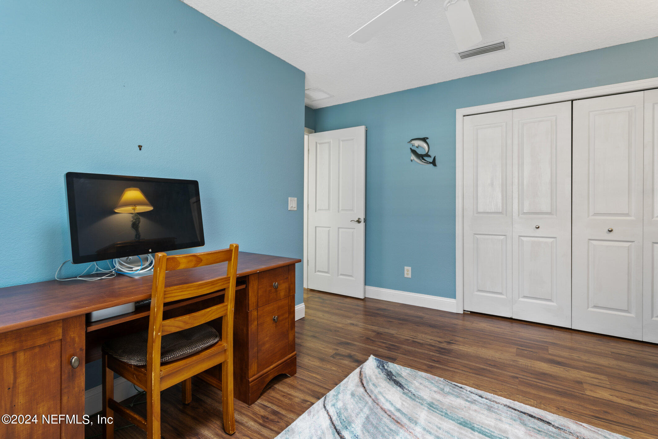 121 Cypress Road St. Augustine, FL 32086 - Photo 28 of 60 a view of a livingroom with furniture and wooden floor