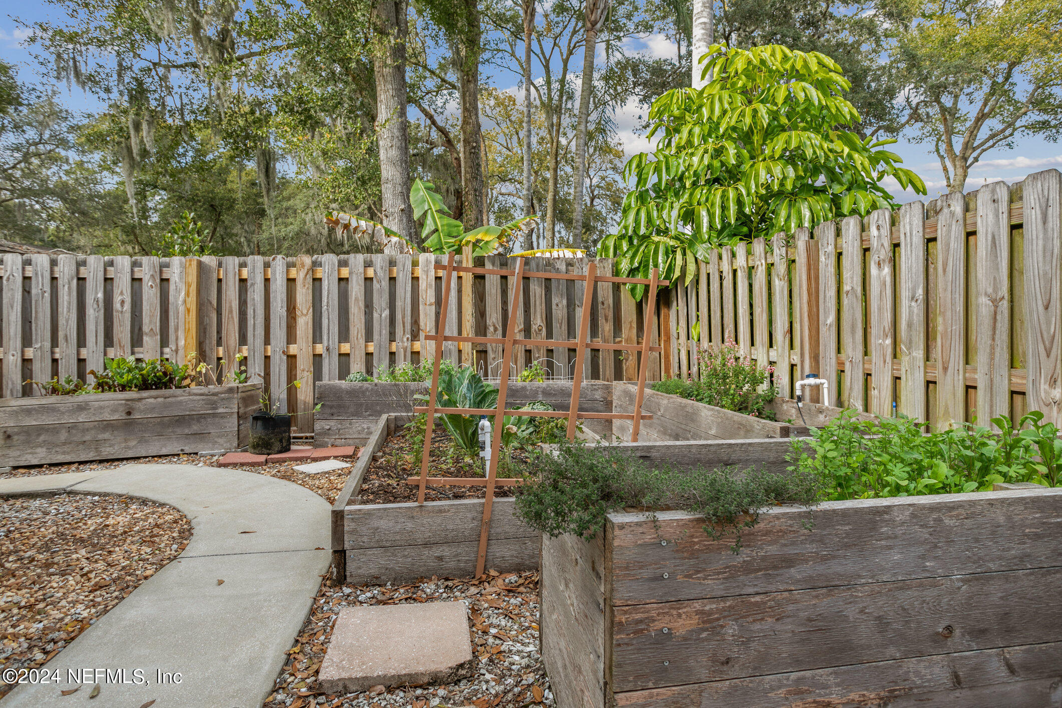 121 Cypress Road St. Augustine, FL 32086 - Photo 39 of 60 a house view with a garden space