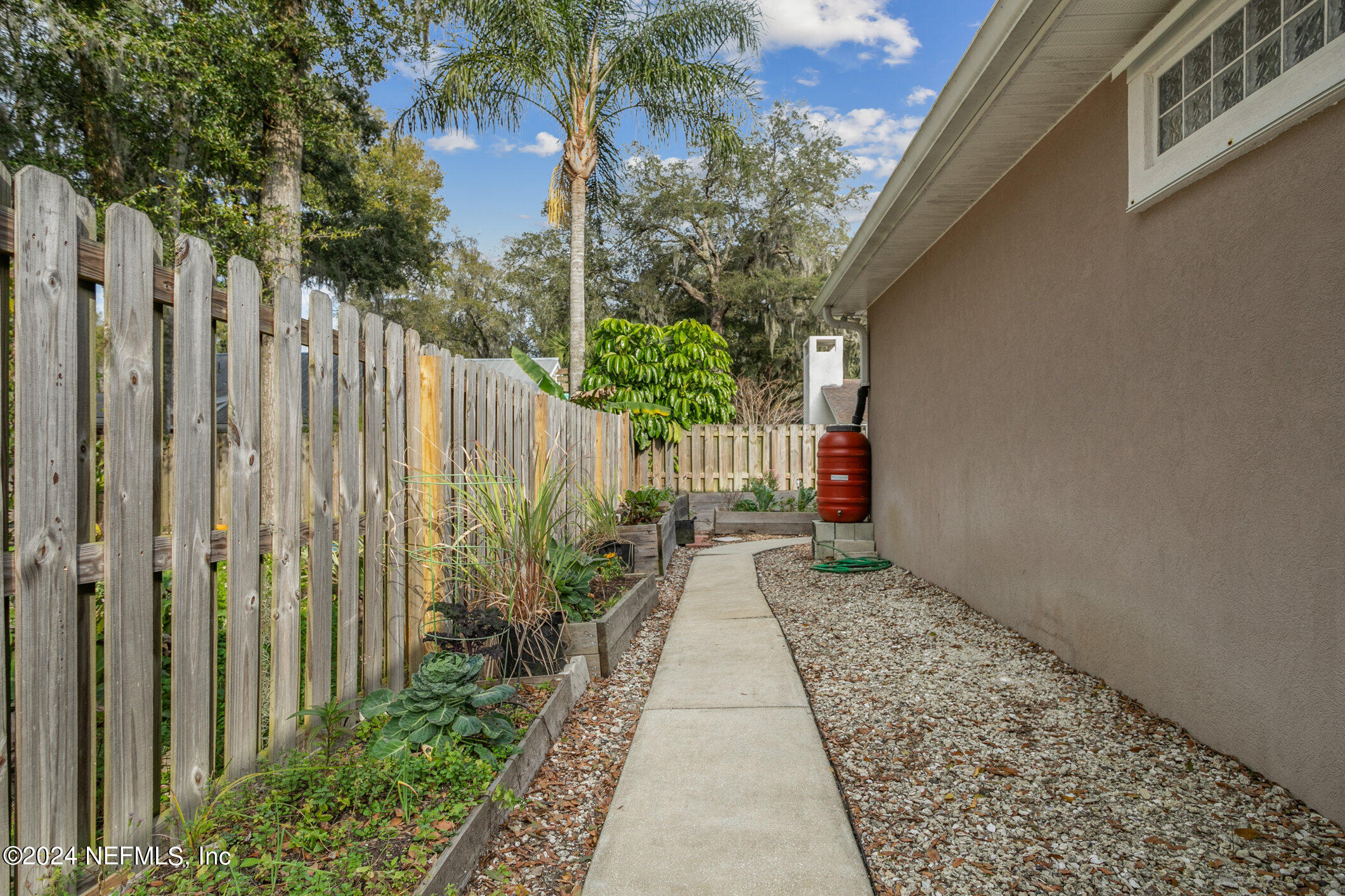 121 Cypress Road St. Augustine, FL 32086 - Photo 40 of 60 a view of a pathway with a yard