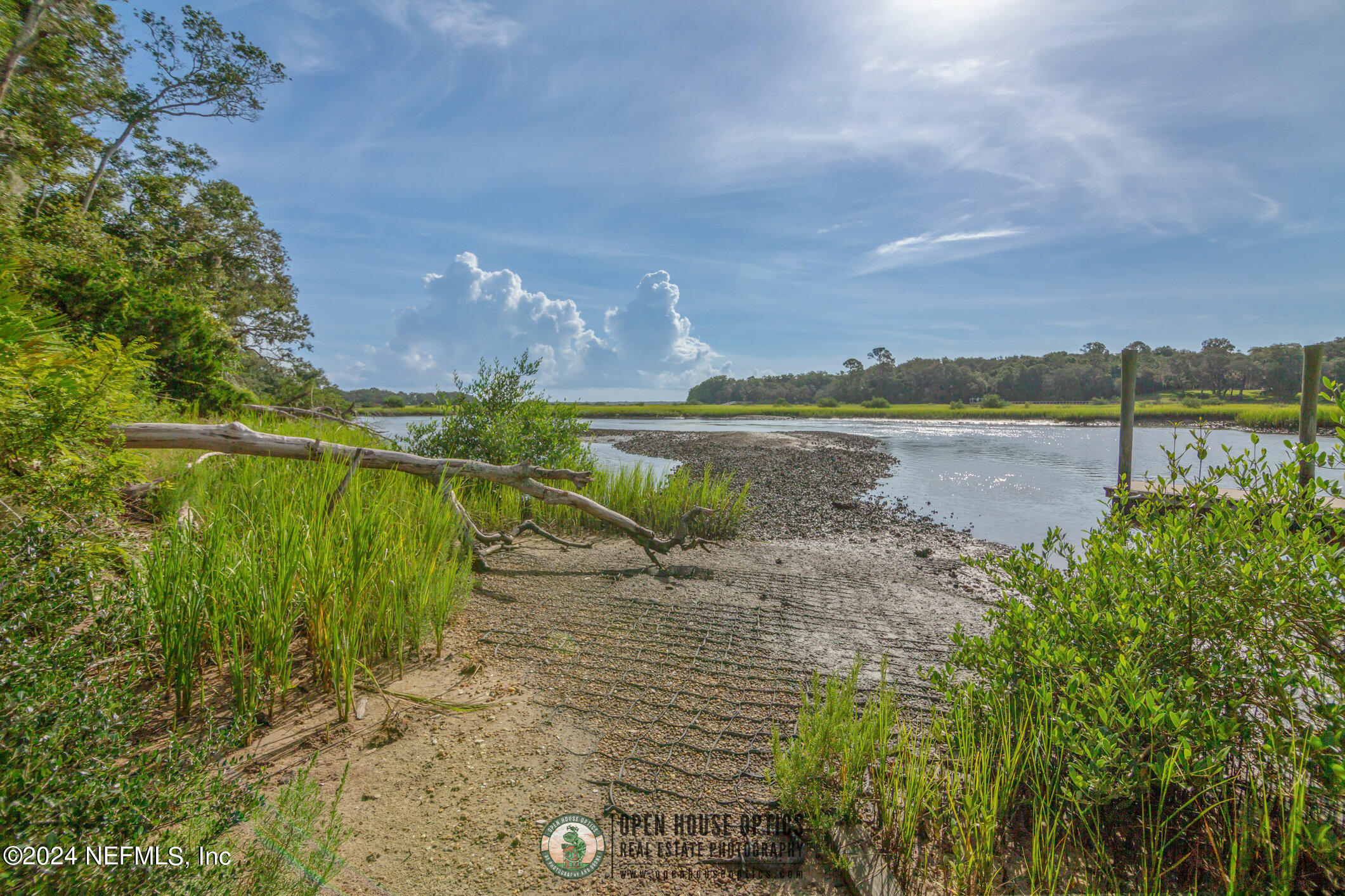 121 Cypress Road St. Augustine, FL 32086 - Photo 55 of 60 a view of a lake with a big yard