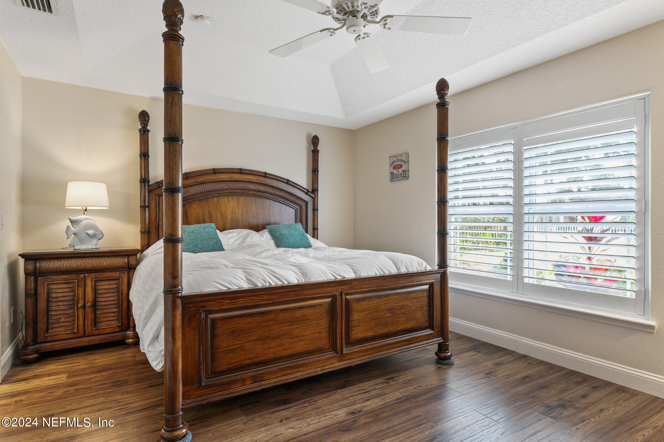 121 Cypress Road St. Augustine, FL 32086 - Photo 8 of 60 a bedroom with a bed and a window