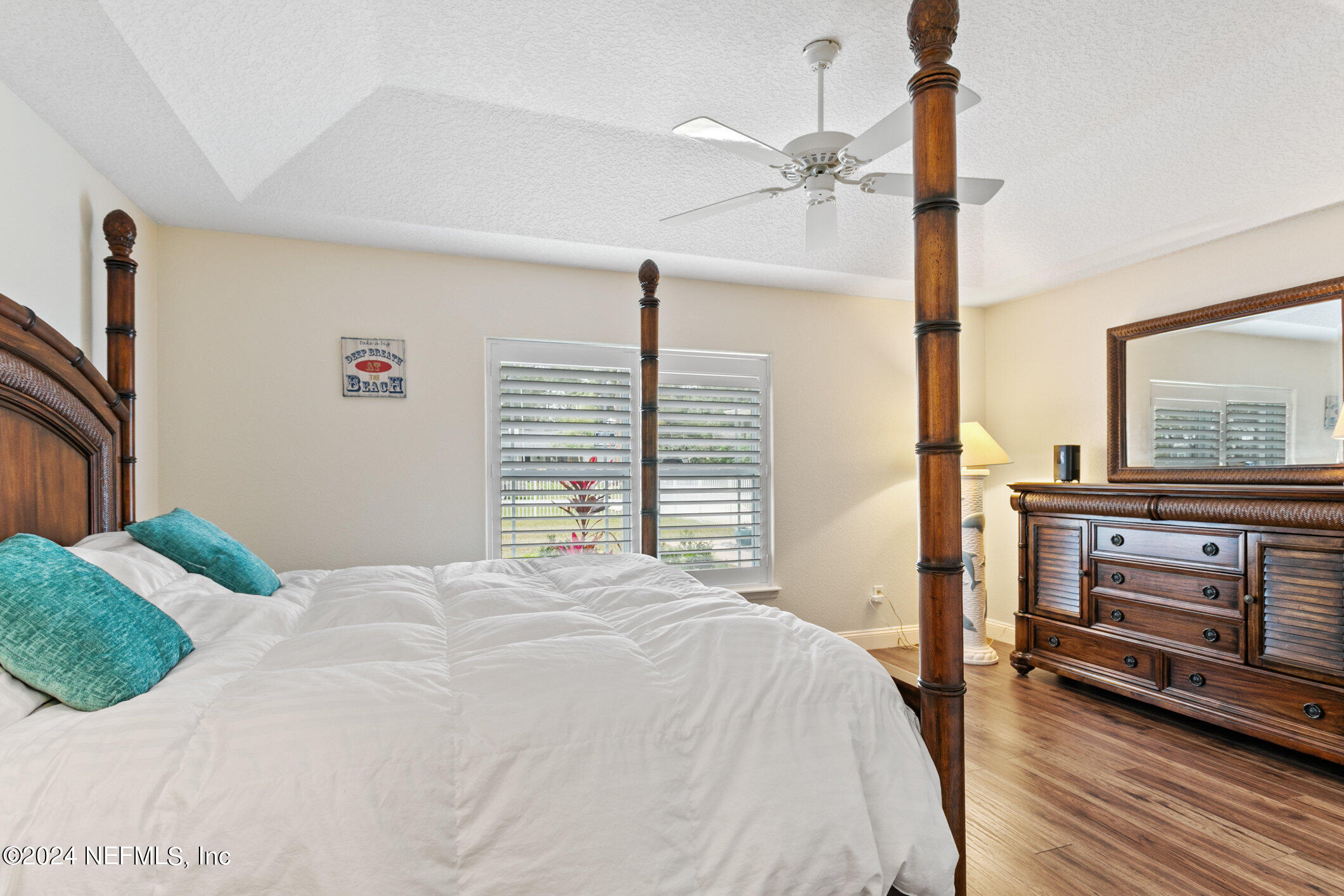 121 Cypress Road St. Augustine, FL 32086 - Photo 10 of 60 a bedroom with a bed and a fireplace