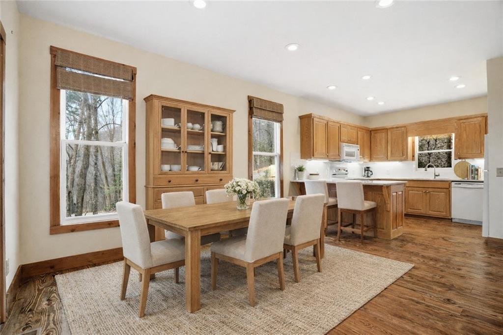 35 Red Oak Point Big Canoe, GA 30143 - Photo 15 of 62 a view of a dining room with furniture and wooden floor