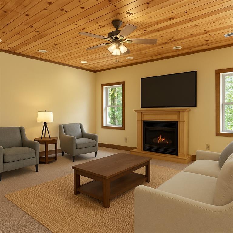 35 Red Oak Point Big Canoe, GA 30143 - Photo 37 of 62 a living room with furniture a flat screen tv and a fireplace