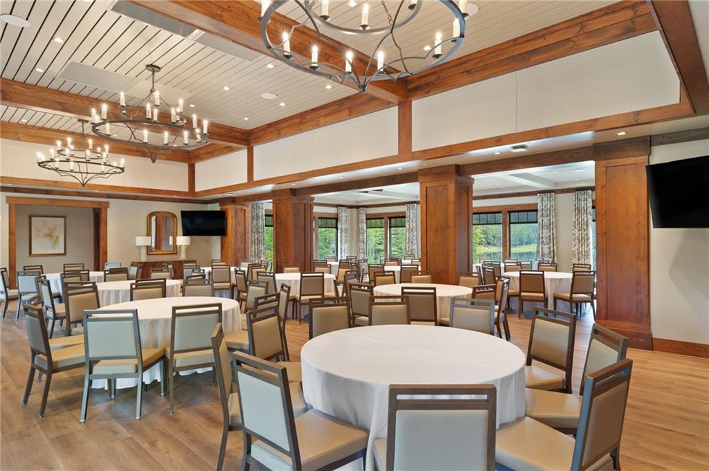 35 Red Oak Point Big Canoe, GA 30143 - Photo 54 of 62 a view of a dining room with furniture window and wooden floor
