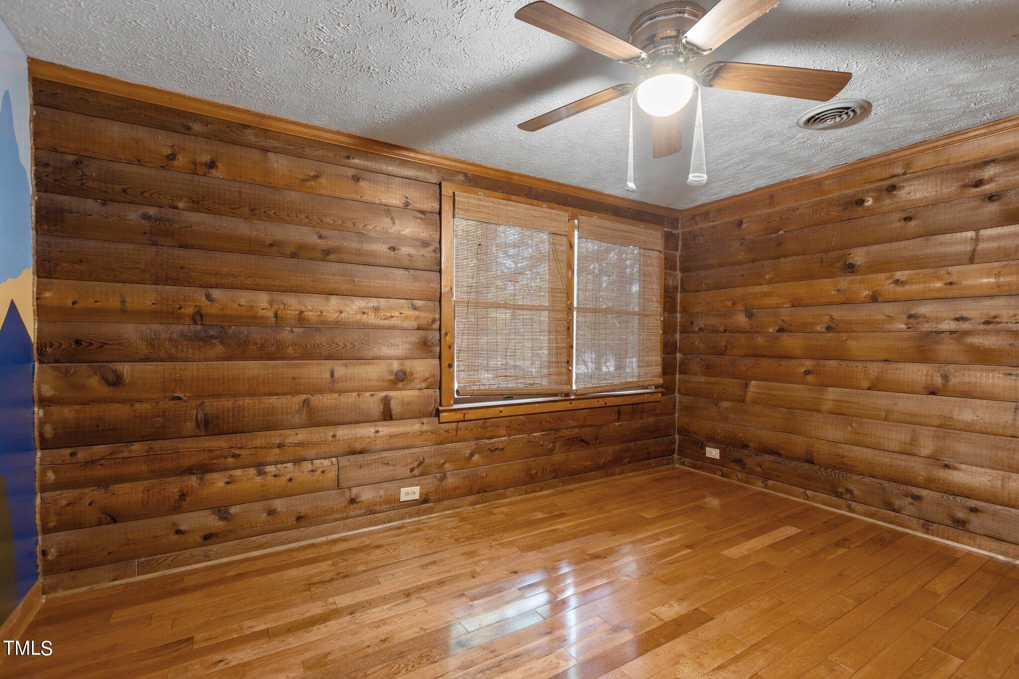 1819 Chambers Loop Road Timberlake, NC 27583 - Photo 22 of 41 a view of empty room with a window and a ceiling fan