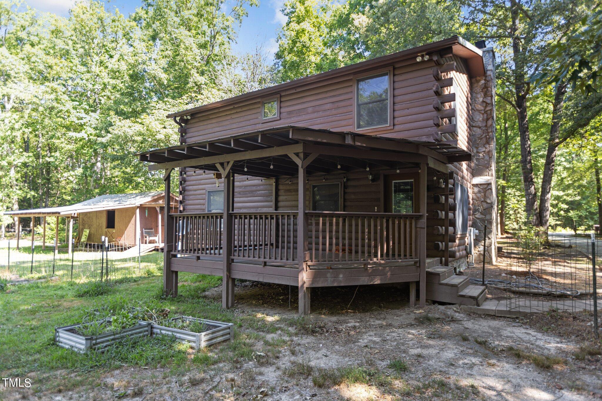 1819 Chambers Loop Road Timberlake, NC 27583 - Photo 29 of 41 a view of a house with a yard