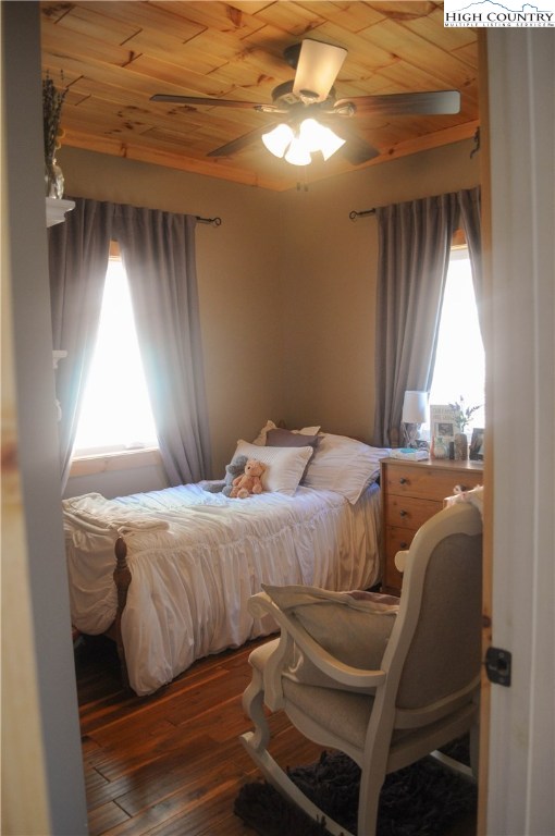 4935 Wildcat Road Deep Gap, NC 28618 - Photo 20 of 33 a bedroom with a bed and window