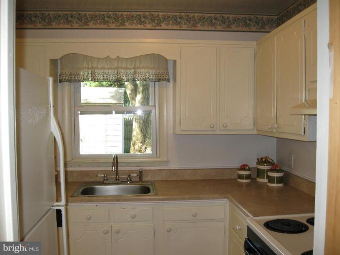 1619 Ruxton Road Edgewater, MD 21037 - Photo 6 of 10 a kitchen with a sink and cabinets