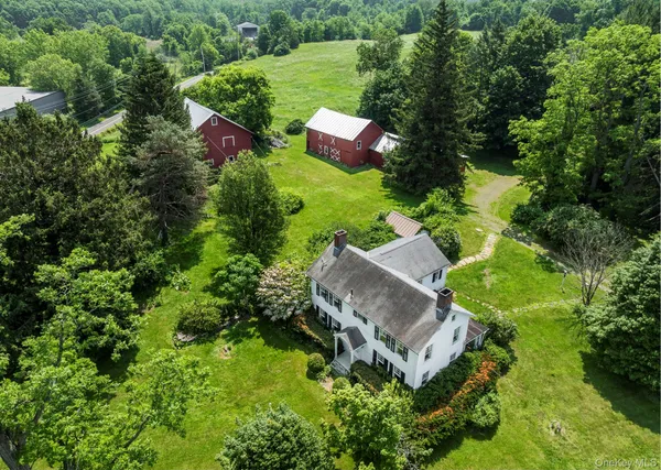 an aerial view of a house with a garden
