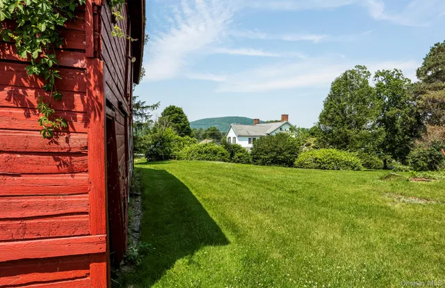 a view of a yard with an trees