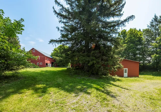a view of a backyard with garden