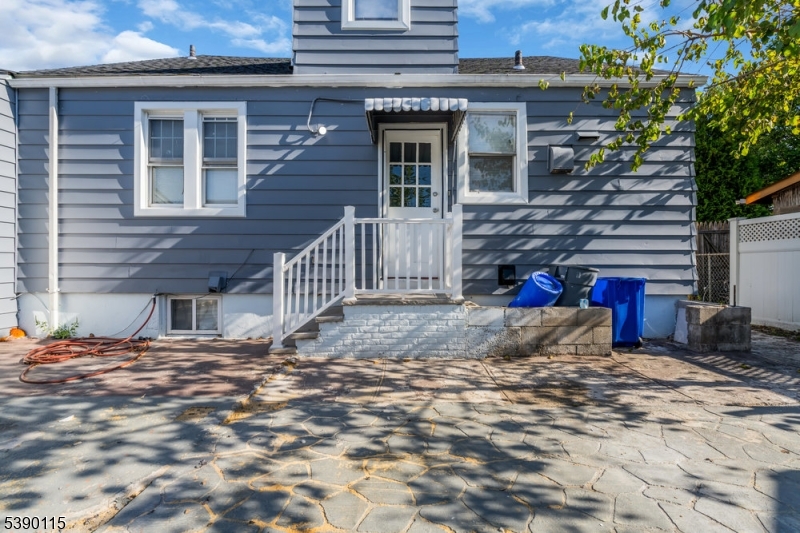 2144 Tyler Street Union, NJ 07083 - Photo 13 of 21 a view of a house with a wooden fence