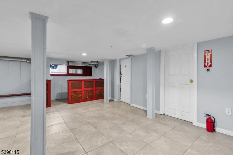 2144 Tyler Street Union, NJ 07083 - Photo 21 of 21 a big room with wooden cabinets