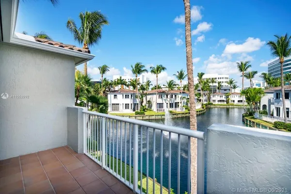 a bedroom with a bed and a table