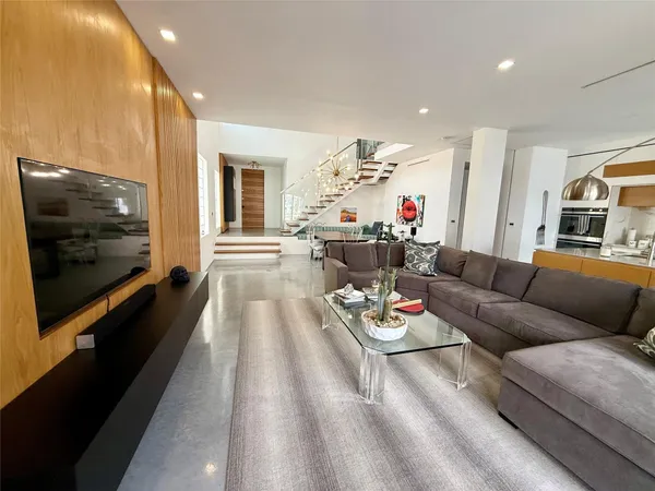 a view of a living room and dining room