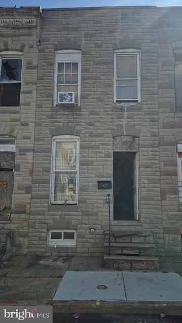 a brick house with a door