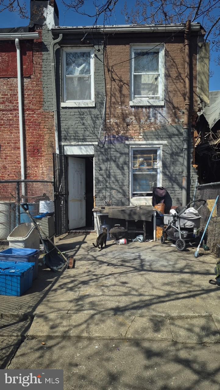 355 Furrow Street Baltimore, MD 21223 - Photo 2 of 2 a view of a house with a patio