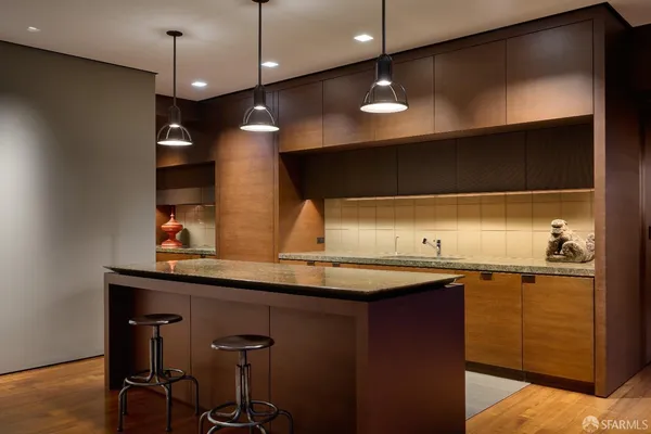 a view of an empty room with shelves