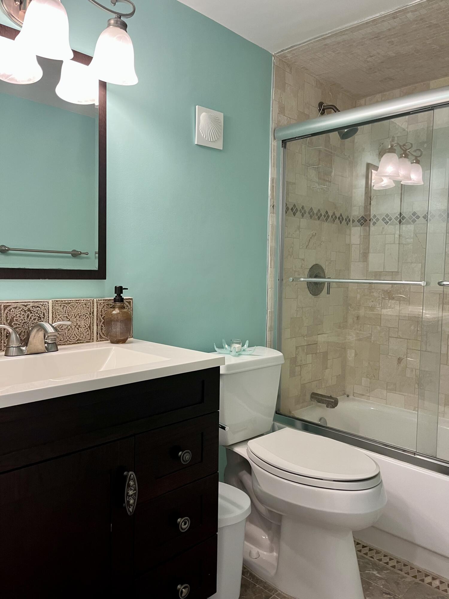 5701 Northwest 2nd Avenue, Unit 101 Boca Raton, FL 33487 - Photo 11 of 16 Guest Bath