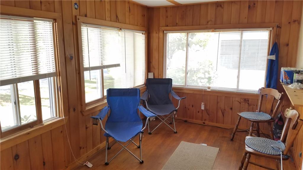 62 East Dixfield Road Jay, ME 04239 - Photo 4 of 12 Bright 3-season porch with Apt #2