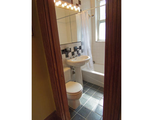 30 Kilsyth Road, Unit 1 Brookline, MA 02445 - Photo 11 of 12 a bathroom with a sink a toilet and shower