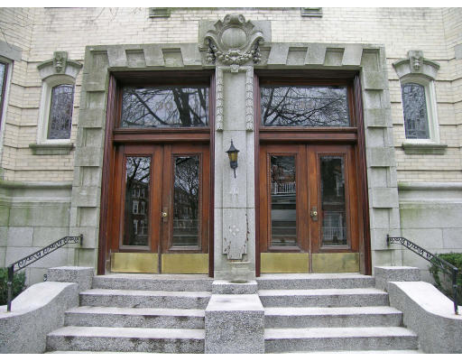 30 Kilsyth Road, Unit 1 Brookline, MA 02445 - Photo 12 of 12 a front view of a house with a garden and plants