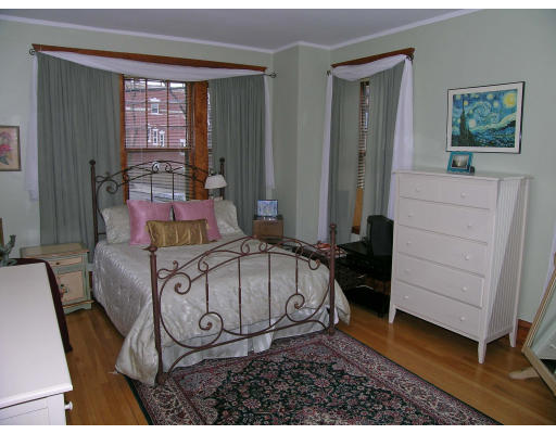 30 Kilsyth Road, Unit 1 Brookline, MA 02445 - Photo 3 of 12 a room with furniture a window and a table