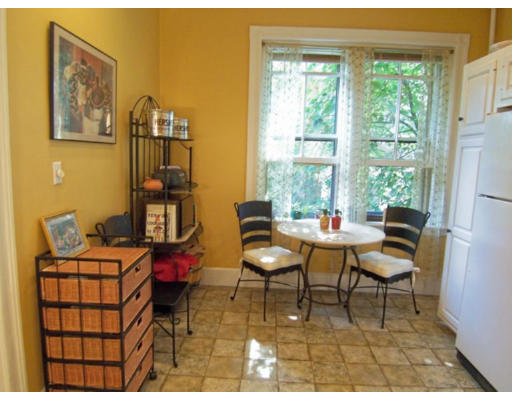 30 Kilsyth Road, Unit 1 Brookline, MA 02445 - Photo 5 of 12 a living room with furniture a rug and a window