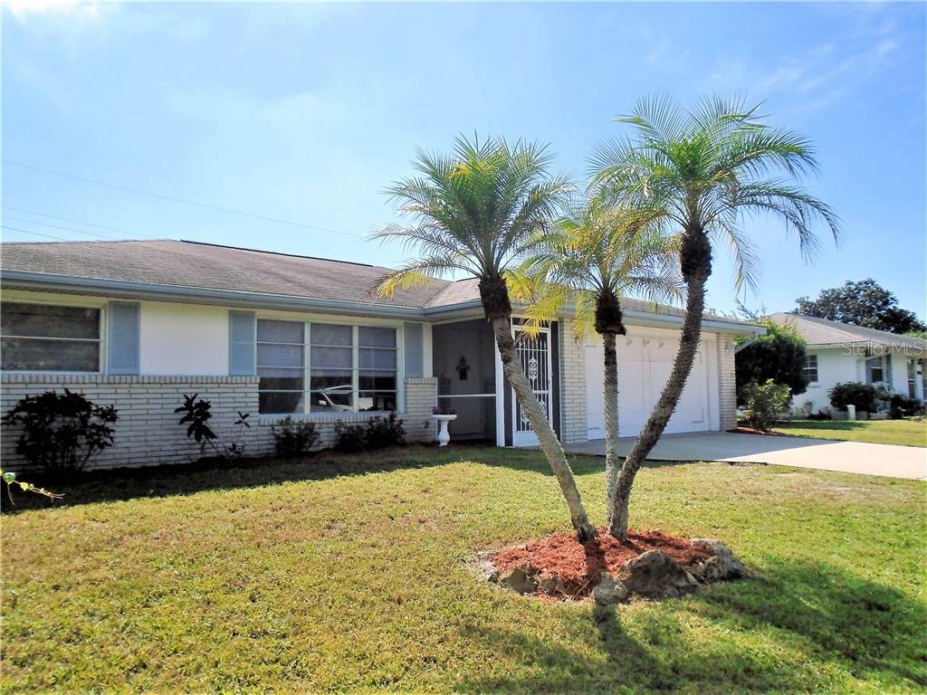 616 Center Road Venice, FL 34293 - Photo 1 of 1 View of home from left side of front yard.