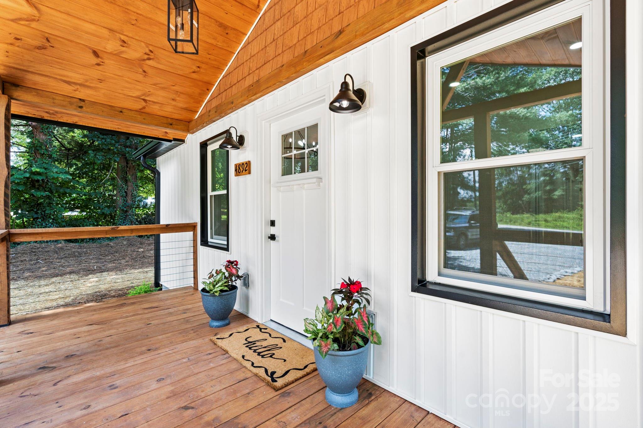 4892 Charlie Crawley Road Morganton, NC 28655 - Photo 36 of 37 a front view of a house with wooden floor