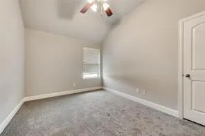 an empty room with a empty space and a window