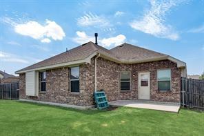 698 Harper Drive Fate, TX 75087 - Photo 18 of 18 a front view of a house with a garden