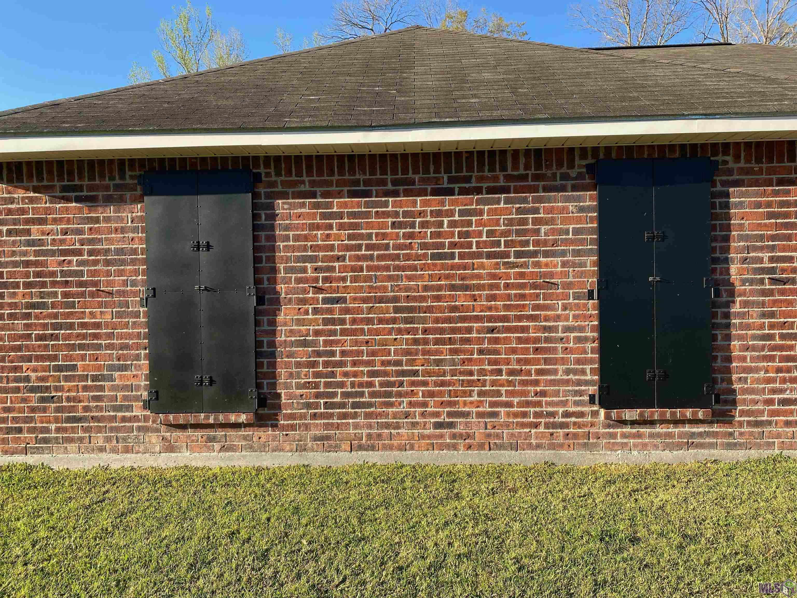 14455 Sunnyhill Avenue Baton Rouge, LA 70819 - Photo 19 of 21 Storm Shutters