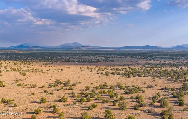 a view of ocean with sunset