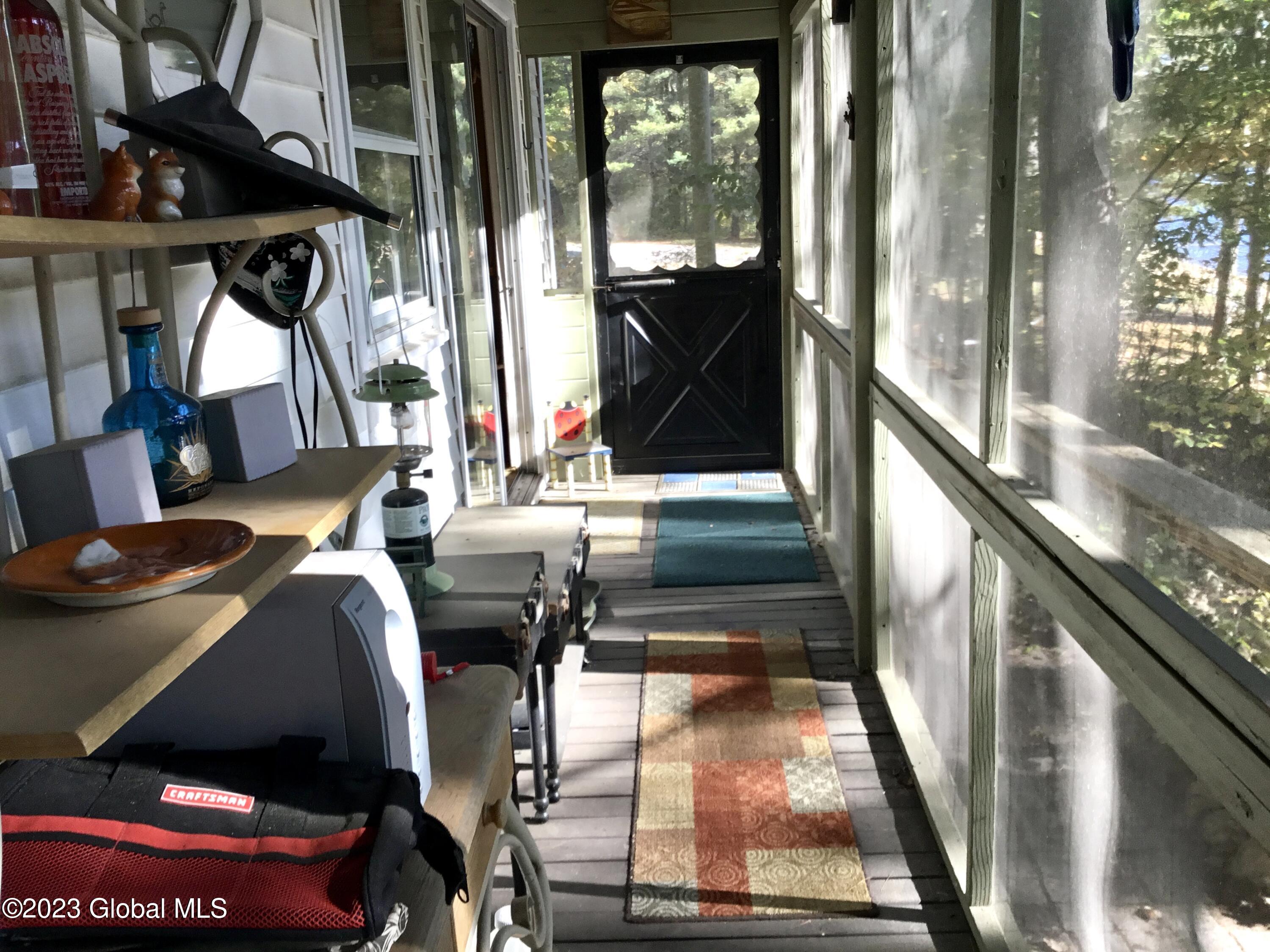 160 Smith Beach Road Northampton, NY 12134 - Photo 15 of 24 Enclosed porch