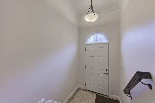 a kitchen with stainless steel appliances granite countertop a sink a stove and a granite counter top