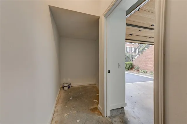 a view of a street with a building on the road