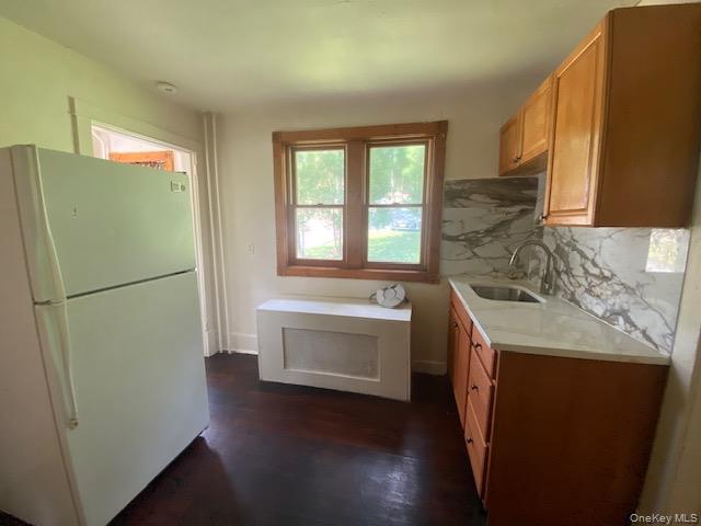 72 North Liberty Drive, Unit 1 Stony Point, NY 10980 - Photo 3 of 8 a utility room with wooden floor washer and dryer
