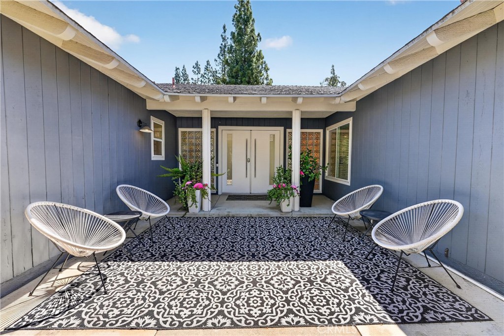 945 Le Conte Drive Riverside, CA 92507 - Photo 4 of 36 When you open the brown fence you enter upon this grand entrance
