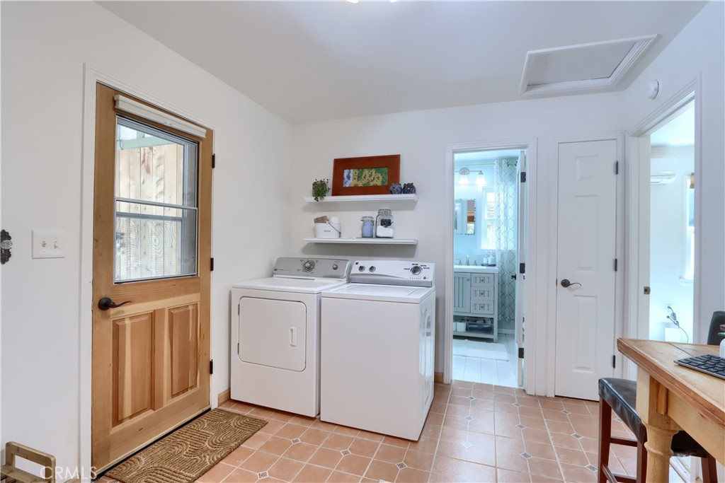 5641B Darrah Road Mariposa, CA 95338 - Photo 16 of 55 a room that has a lot of kitchen furniture and a window in it