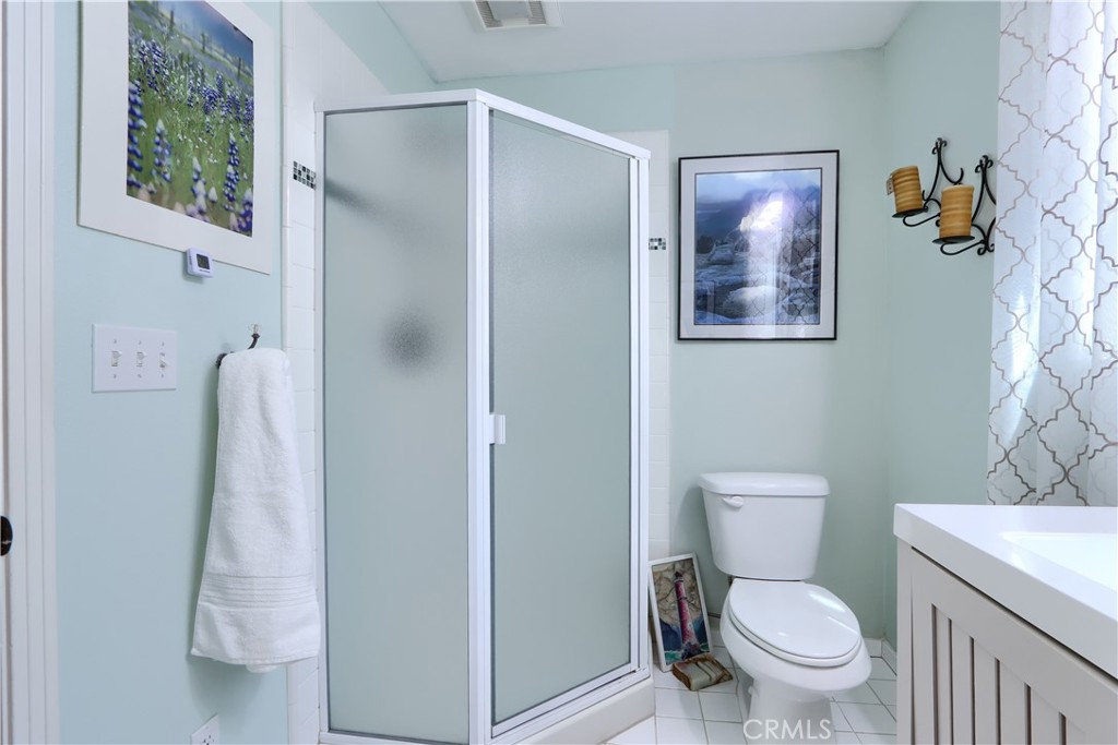 5641B Darrah Road Mariposa, CA 95338 - Photo 20 of 55 a white toilet sitting next to a bathroom sink