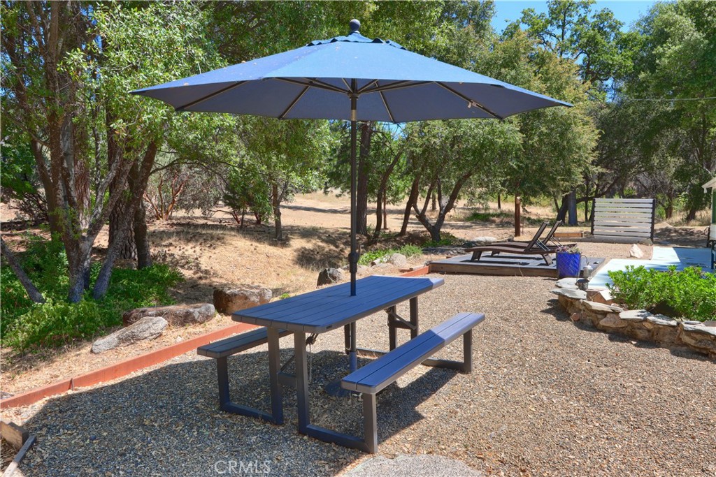 5641B Darrah Road Mariposa, CA 95338 - Photo 30 of 55 a view of a backyard with sitting area and furniture