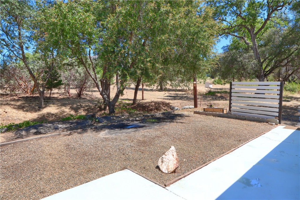 5641B Darrah Road Mariposa, CA 95338 - Photo 31 of 55 a view of a backyard with trees